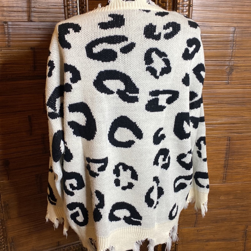 Women’s Cream and Black Distressed Leopard Print Sweater - Picture 4 of 7